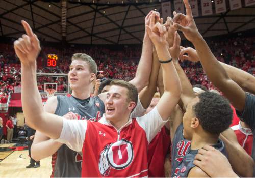 Rick Egan  |  The Salt Lake Tribune

The Utes celebrate their 57-55 win over Colorado, in Pac-12 basketball action at the Huntsman Center Saturday, March 5, 2016.