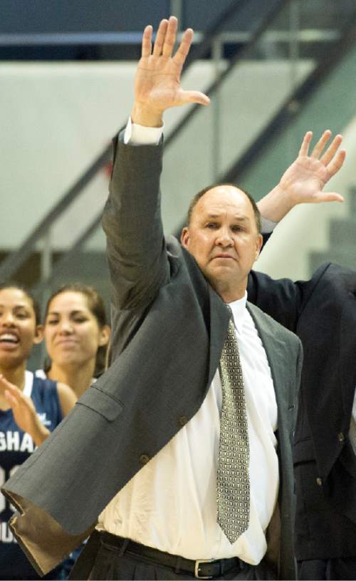Rick Egan  |  The Salt Lake Tribune

Brigham Young Cougars head coach Jeff Judkins signals to his team, as they lead the Utes in the final minutes of the game, in basketball action, BYU vs. Utah, in the Marriott Center, Saturday, December 12, 2015.