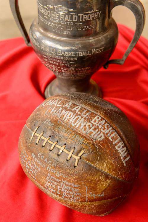 Trent Nelson  |  The Salt Lake Tribune
The University of Utah's 1916 AAU Championship Trophy and a commemorative basketball from that tournament, on display at the Huntsman Center in Salt Lake City, Tuesday March 15, 2016.