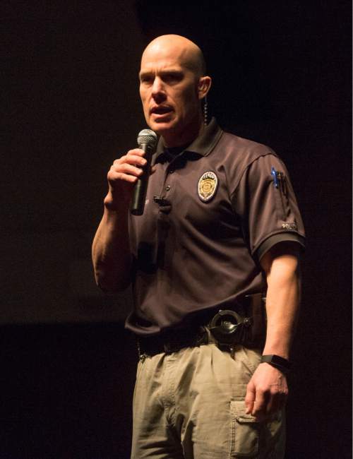 Rick Egan  |  The Salt Lake Tribune

Officer Scott Lauritzen talks to the seniors at Herriman High about the dangers of distracted driving, Thursday, March 17, 2016.