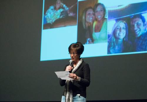 Rick Egan  |  The Salt Lake Tribune

Debbie Hill, tell the story of her daughter Chelsie, during an assembly with the seniors at Herriman High about the dangers of distracted driving, Thursday, March 17, 2016.