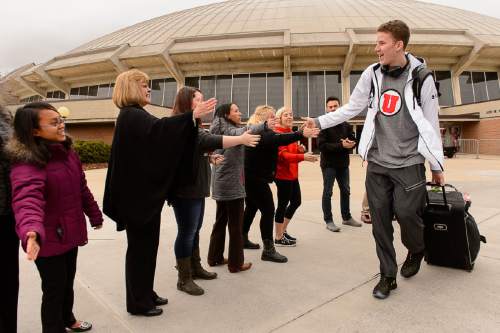Trent Nelson  |  The Salt Lake Tribune
Utah basketball player Jakob Poeltl is greeted by fans as the team departs for the NCAA Tournament, Tuesday March 15, 2016.