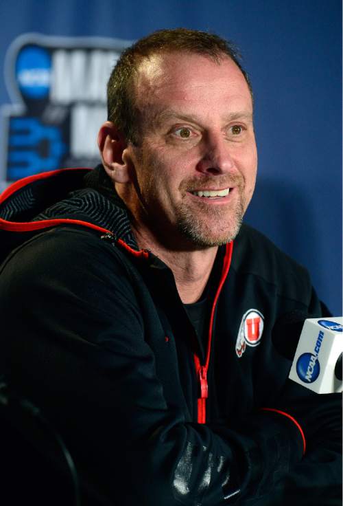 Scott Sommerdorf   |  The Salt Lake Tribune  
University of Utah head coach Larry Krystkowiak answers questions during the interview session prior to their practice in Denver, Wednesday, March 16, 2016.