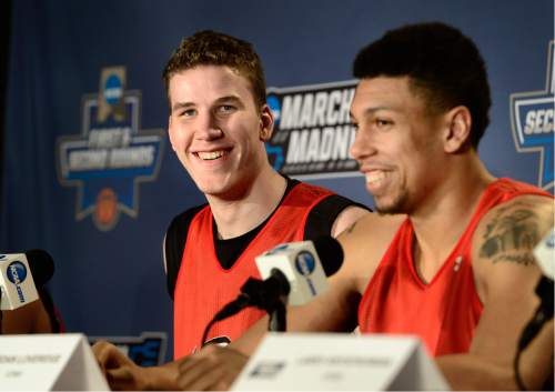 Scott Sommerdorf   |  The Salt Lake Tribune  
University of Utah center Jakob Poeltl, left, and Jordan Loveridge laugh and pretend to get up to leave as at first there were no questions forthcoming during the interview session prior to their practice in Denver, Wednesday, March 16, 2016. They will face Fresno State Thursday.