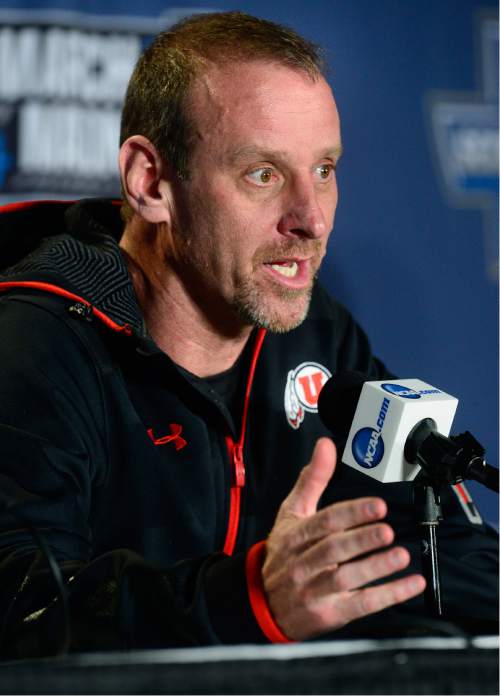 Scott Sommerdorf   |  The Salt Lake Tribune  
University of Utah head coach Larry Krystkowiak answers questions during the interview session prior to their practice in Denver, Wednesday, March 16, 2016.
