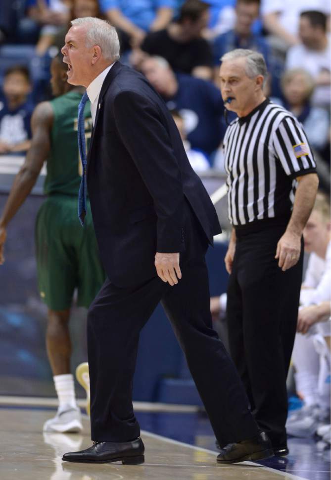 Steve Griffin  |  The Salt Lake Tribune

BYU head coach Dave Rose screams defensive assignments during the first round of the NIT between BYU and UAB at the Marriott Center in Provo, Wednesday, March 16, 2016.