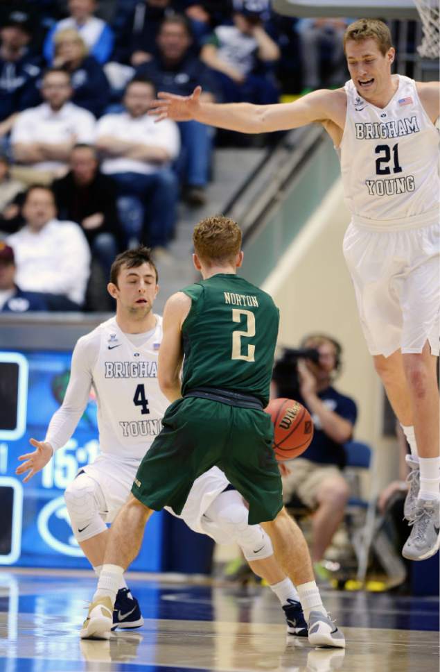 Steve Griffin  |  The Salt Lake Tribune


Brigham Young Cougars forward Kyle Davis (21) sails past UAB Blazers guard Nick Norton (2) as he passes the ball during the first round of the NIT between BYU and UAB at the Marriott Center in Provo, Wednesday, March 16, 2016.