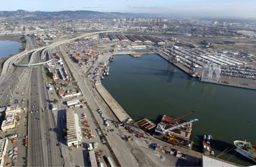 In this December 2008 photo, the former Oakland Army Base stands in Oakland, Calif. Oakland officials have approved a $1 billion deal to transform the former base into a state-of-the-art distribution center that's expected to create thousands of jobs. With a 7-0 vote Tuesday, June, 19, 2012, the city council approved a series of agreements with developers to transform 130 acres of the former base into a shipping, packaging and warehousing complex next to the Port of Oakland. (AP Photo/Bay Area News Group, Laura A. Oda) MAGS OUT  LOCALS PLEASE CREDIT