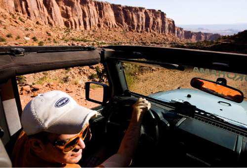 Djamila Grossman  |  The Salt Lake Tribune
Rob Covert drives a jeep on Long Canyon Road near Moab, Utah, on Saturday, Oct. 2, 2010.
