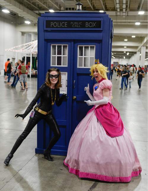 Franciso Kjolseth  |  The Salt Lake Tribune
Heidi Mason as "Catwoman," and Winter Thayne as "Princess Peach," get their "Doctor Who" on at Salt Lake Comic Con's FanX in 2014.