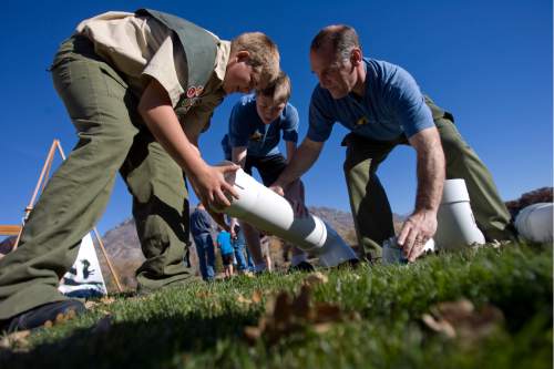 Tribune file photo
John Petersen, Ammon Harris and Tony Harris build a container to recycle monofilament fishing line at the pond at Highland Glen Park in Highland, Utah on October 29, 2012. John Peterson decided to do outreach about the dangers of monofilament fishing line to wildlife as his Eagle Scout project and have been able to install these container at a few locations near fishing areas.