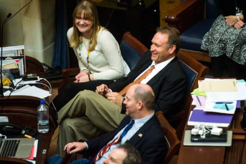 Chris Detrick  |  The Salt Lake Tribune
Senator Mark Madsen laughs after Governor Gary R. Herbert asked "Qué pasa" regarding Madsen's proposed move to South America when his term in the Legislature ends during Senate Floor Time at the Utah State Capitol Friday March 11, 2016.