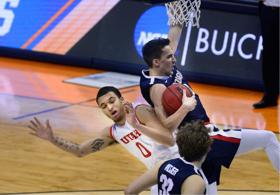 Scott Sommerdorf   |  The Salt Lake Tribune  
Utah F Brekkott Chapman (0) gets caught underneath the basket during a Goinzaga rebound  during first half play. Gonzaga held a 44-29 lead over Utah at the half, Saturday, March 19, 2016.