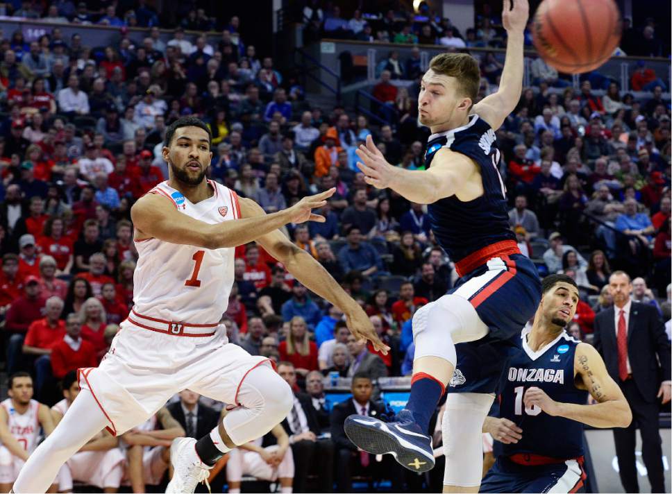 Scott Sommerdorf   |  The Salt Lake Tribune  
Utah G Isaiah Wright (1) passes past Gonzaga F Domantas Sabonis (11) during second half play. Gonzaga beat Utah 82-59 in Denver, Saturday, March 19, 2016.