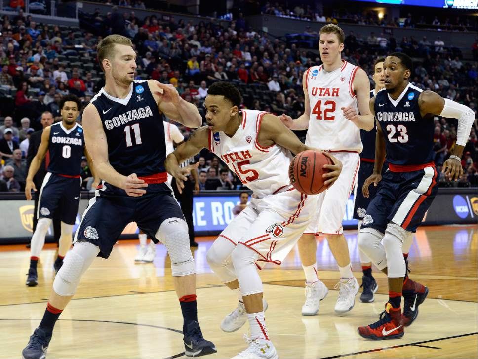 Scott Sommerdorf   |  The Salt Lake Tribune  
Utah G Lorenzo Bonam (15) works against Gonzaga F Domantas Sabonis (11) during second half play. Gonzaga beat Utah 82-59 in Denver, Saturday, March 19, 2016.