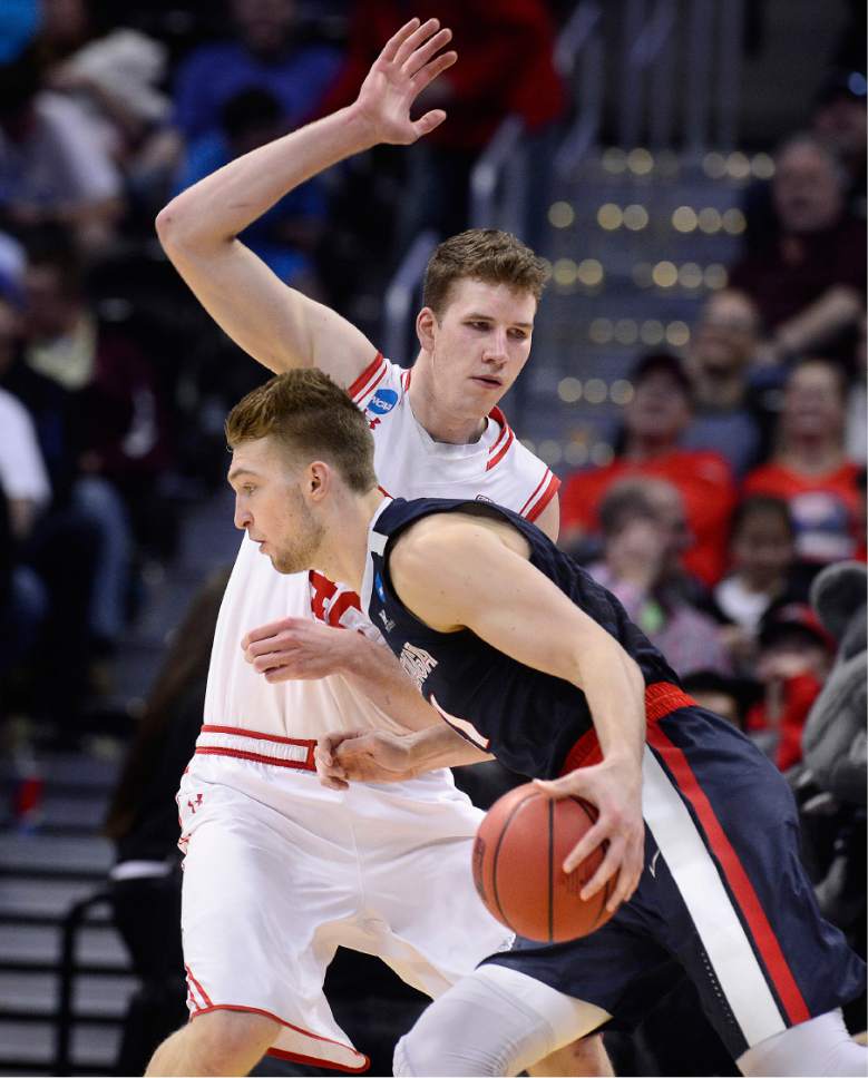 Scott Sommerdorf   |  The Salt Lake Tribune  
Utah F Jakob Poeltl (42) tries to defend against Gonzaga F Domantas Sabonis (11) during second half play. Gonzaga beat Utah 82-59 in Denver, Saturday, March 19, 2016.