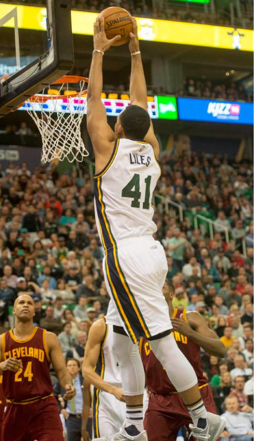 Rick Egan  |  The Salt Lake Tribune

Utah Jazz forward Trey Lyles (41) dunks the ball, in NBA action, in Salt Lake City, Monday March 14, 2016.