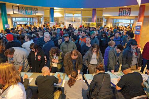 Leah Hogsten  |  The Salt Lake Tribune
Lines and wait times were long at the Democratic caucus at Mountain View Elementary School as both registered party members and unaffiliated voters cast their ballots, Tuesday, March 22, 2016.