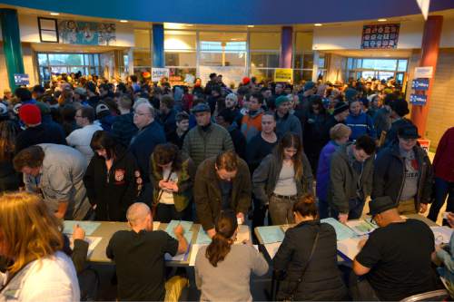 Leah Hogsten  |  The Salt Lake Tribune
Lines and wait times were long at the Democratic caucus at Mountain View Elementary School as both registered party members and unaffiliated voters cast their ballots, Tuesday, March 22, 2016.