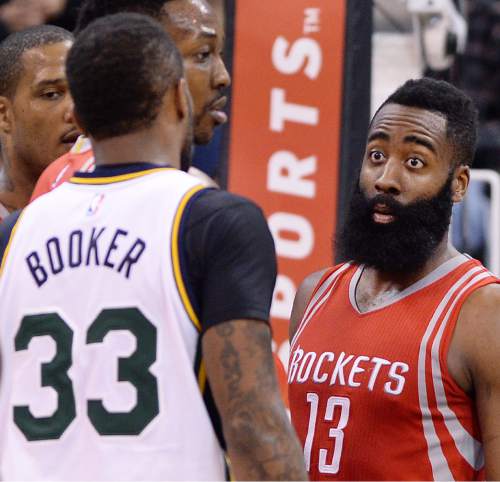 Steve Griffin  |  The Salt Lake Tribune


Houston Rockets guard James Harden (13) gets wide eyed as he and Utah Jazz forward Trevor Booker (33) get into a pushing match during the Utah Jazz versus Houston Rockets game at Vivint Smart Home Arena in Salt Lake City, Tuesday, February 23, 2016. Both players were called for a technical foul on the play.