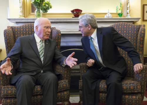 Sen. Patrick Leahy, D-Vt., left, the top Democrat on the Senate Judiciary Committee hosts a meeting with Judge Merrick Garland, President Barack Obama's choice to replace the late Justice Antonin Scalia on the Supreme Court, on Capitol Hill in Washington, Thursday, March 17, 2016. (AP Photo/J. Scott Applewhite)