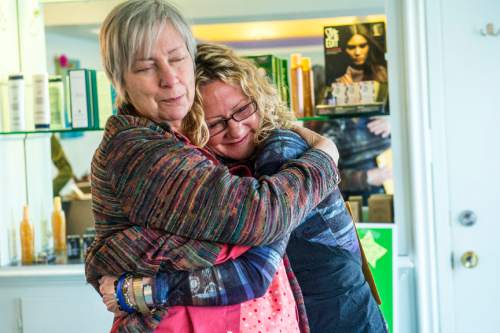 Chris Detrick  |  The Salt Lake Tribune
Brenda Sue Cowley hugs customer Sheri Young at 9th Avenue Salon Wednesday March 23, 2016.  The 9th Avenue Salon is closing this week after having been open for more than 40 years. Actor Brenda Sue Cowley took over the salon seven years ago after the passing of its well-known owner, Michael Adamson.
