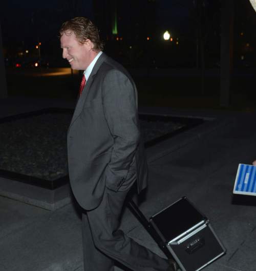 Al Hartmann  |  The Salt Lake Tribune
St. George businessman  Jeremy Johnson walks to Federal Court in Salt Lake City early Thursday morning March 17 for the final day of his trial.