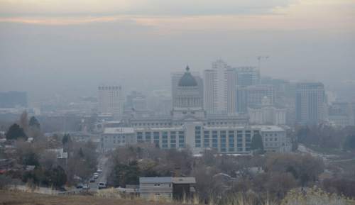 Al Hartmann  |  The Salt Lake Tribune
Hazy scene of downtown Salt Lake City at 9:30 a.m. Friday Dec. 4 a few blocks north of the the Utah State Capitol.  Air quality was in the yellow range.