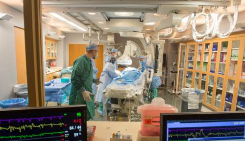 Rick Egan  |  The Salt Lake Tribune

Doctors perform a coronary angiogram on a patient in the Cardiac Catheterization Laboratory at Intermountain Medical Center Heart Institute, Friday, Nov. 6, 2015.