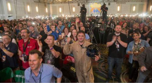 Rick Egan  |  The Salt Lake Tribune

Fans cheer for Buzz Aldrin, after he spoke about his flight to the moon, in the Grand Ballroom on opening day of Salt Lake Comic Con FanX Experience, at the Salt Palace. Thursday, March 24, 2016.