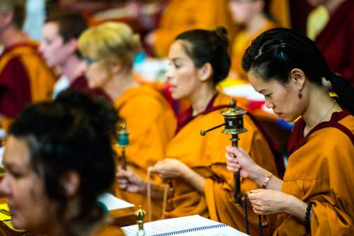 Chris Detrick  |  The Salt Lake Tribune
Valorie Shimoda participates in the 9th annual Prayers for Compassion at Urgyen Samten Ling Gonpa Thursday July 2, 2015.  Utah Buddhists at this traditional Tibetan temple in Salt Lake City will chant more than a million mantras in annual around-the-clock Prayers for Compassion for 2015, this year dedicated to helping rebuild earthquake-damaged Nepal.