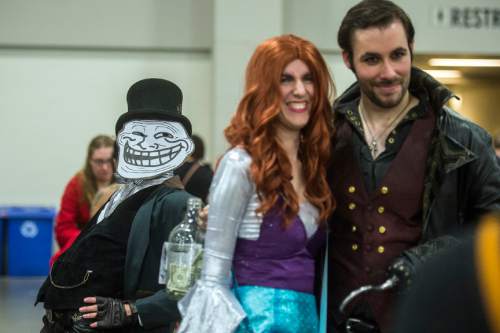 Chris Detrick  |  The Salt Lake Tribune
Attendees pose for pictures during Salt Lake Comic Con's FanXperience at the Salt Palace Convention Center Saturday March 26, 2016.