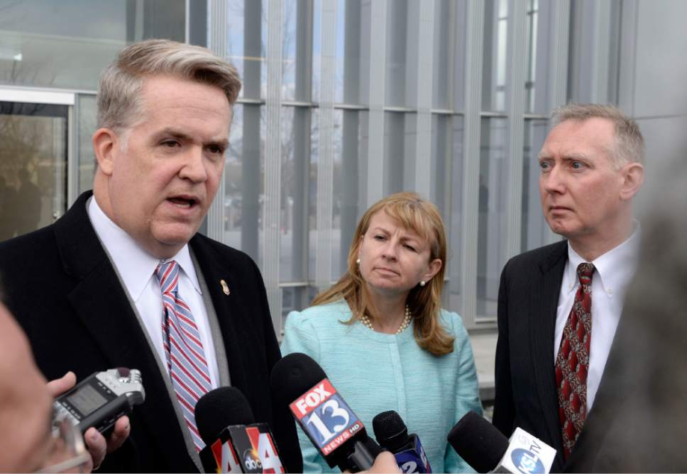 Al Hartmann  |  The Salt Lake Tribune 
John Huber, U.S Attorney for Utah, left, comments to media on the eight guilty counts from Jeremy Johnson's trial in Salt Lake City Friday March 25.   Johnson was found guilty for making false statements to a bank.