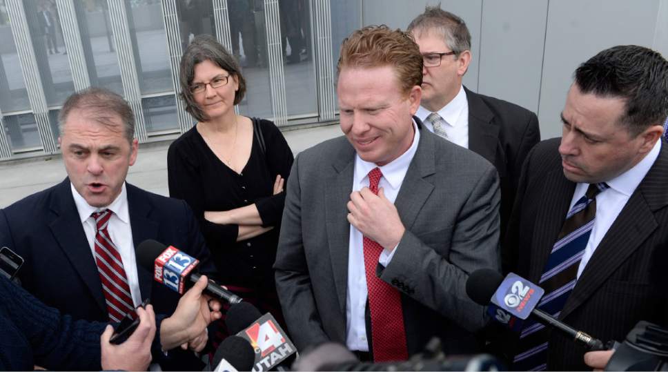 Al Hartmann  |  Tribune file photo
Jeremy Johnson comments to media as he leaves Federal Court in Salt Lake City, March 25, 2016, after being found guilty of making false statements to a bank.