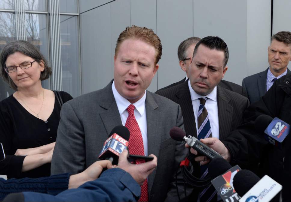 Al Hartmann  |  The Salt Lake Tribune 
Jeremy Johnson comments to media as he leaves Federal Court in Salt Lake City in March after being found guilty of making false statements to a bank.