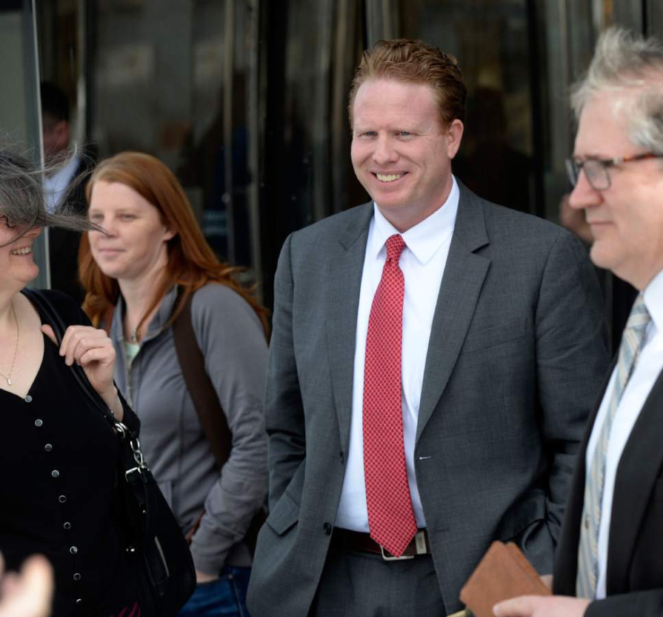 Al Hartmann  |  The Salt Lake Tribune 
Jeremy Johnson comments to media as he leaves Federal Court in Salt Lake City March 25 Friday after being found guilty of making false statements to a bank.