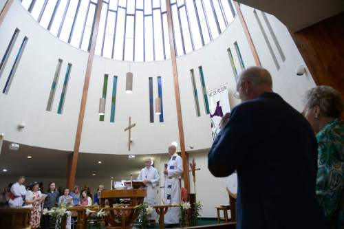 Al Hartmann  |  The Salt Lake Tribune 
Members of the Mount Tabor Lutheran Church attend Easter service Sunday March 27 in Salt Lake City.