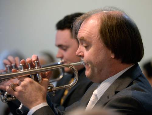 Al Hartmann  |  The Salt Lake Tribune 
Bob and Bobby Brown perform Sonata for two Trumpets and Organ as prelude to Easter service Sunday March 27 at the Mount Tabor Lutheran Church in Salt Lake City.