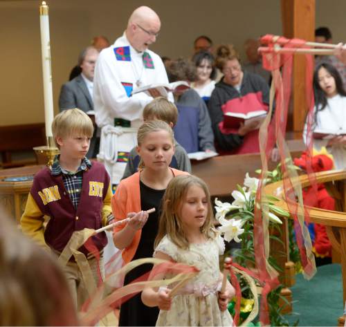 Al Hartmann  |  The Salt Lake Tribune 
Children of Mount Tabor Lutheran Church celebrate Easter service Sunday March 27 in Salt Lake City.