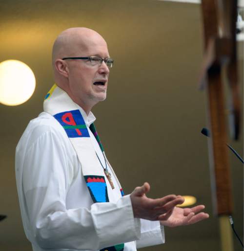 Al Hartmann  |  The Salt Lake Tribune 
The Rev. David Nichols gives the sermon to members of the Mount Tabor Lutheran Church Easter service Sunday March 27 in Salt Lake City.