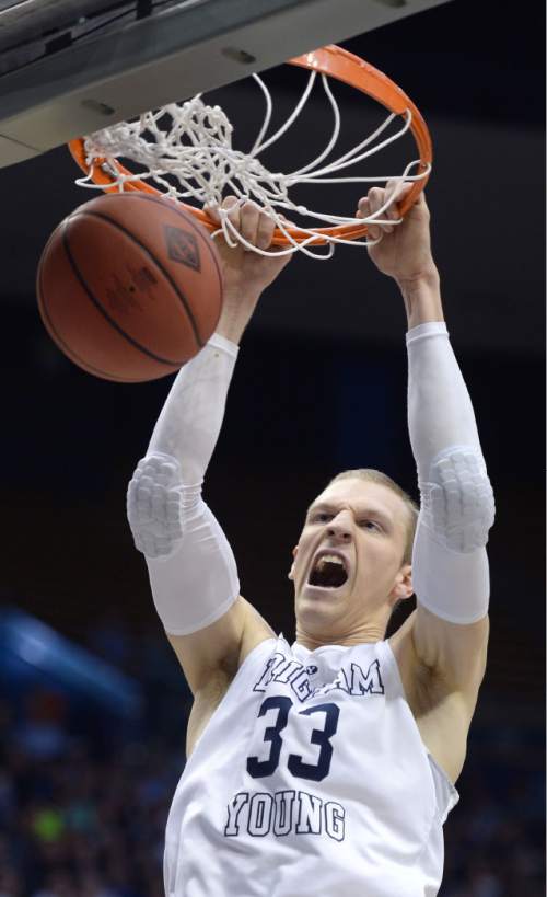 Steve Griffin  |  The Salt Lake Tribune


Brigham Young Cougars forward Nate Austin (33) growls as he throws down a jam during the first round of the NIT between BYU and UAB at the Marriott Center in Provo, Wednesday, March 16, 2016.