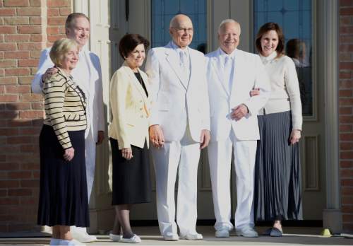 Leah Hogsten  |  The Salt Lake Tribune
l-r Elder Lynn G. Robbins of the Seventy of The Church of Jesus Christ of Latter-Day Saints is joined by his wife Jan, Elder Dallin H. Oaks of Quorum of the Twelve Apostles and his wife, Kristen, and Elder Kent F. Richards of the Seventy and his wife, Marsha, at the Provo City Center Temple cornerstone ceremony. The Provo City Center Temple was dedicated Sunday, March 20, 2016. The Church's 112-year-old Provo Tabernacle burned in December 2010 and only the shell of the building was left. After the burned-out structure was gutted, Mormon leaders decided to use the building's exterior to house the temple.
