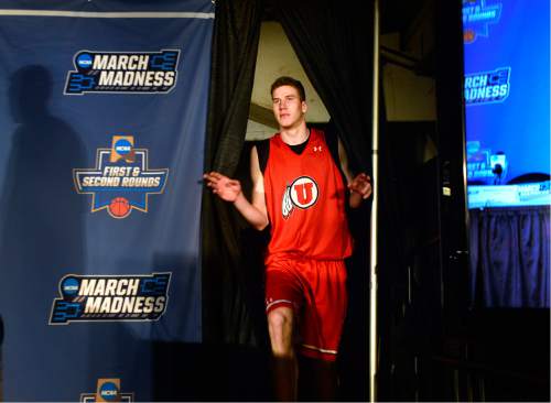 Scott Sommerdorf   |  The Salt Lake Tribune  
University of Utah center Jakob Poeltl enters the stage for interviews prior to their practice session in Denver, Wednesday, March 16, 2016. They will face Fresno State Thursday.