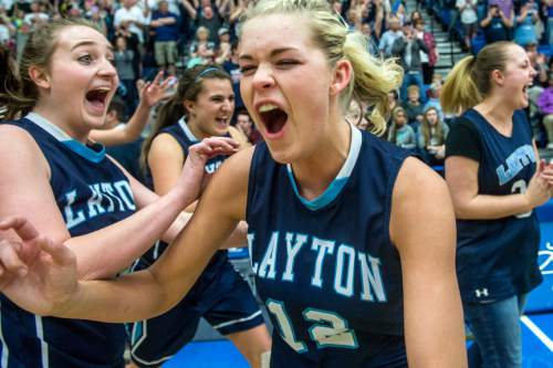 Chris Detrick  |  The Salt Lake Tribune
Layton's Hailey Bassett (12) celebrates with her teammates after winning the 5A girls' basketball championships at Salt Lake Community College Saturday February 27, 2016. Layton defeated Sky View 73-65.