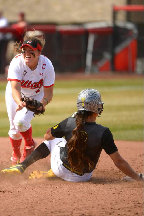Leah Hogsten  |  The Salt Lake Tribune
Utah's Hannah Flippen outs Oregon's Nikki Udria at second. The University of Utah softball team was defeated during their home debut, Saturday, by Oregon, 4-2, March 21, 2015 .