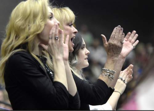 Rick Egan  |  The Salt Lake Tribune

Bountiful High Mandonelles coaches, Rachael Hawkes Rushton, Jan Whittaker and Nikole Black cheer on their team during the State Drill Team Championships at Utah Valley University, Saturday, January 6, 2016