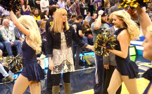 Rick Egan  |  The Salt Lake Tribune

Jan Whittaker directs the America First Credit Union Jazz dancers, at the Jazz - Lakers game, Monday, March 28, 2016. Whittaker has she has been coaching the Jazz dancers for 21 seasons.