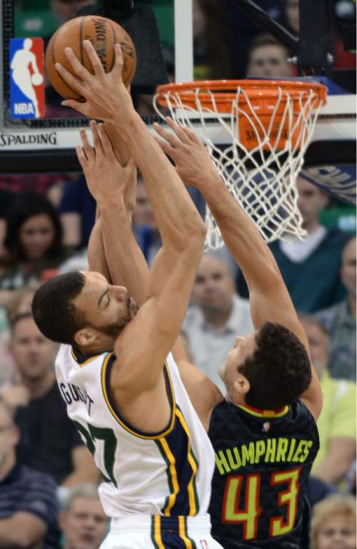 Steve Griffin  |  The Salt Lake Tribune


Utah Jazz center Rudy Gobert (27) rips a rebound away from Atlanta Hawks forward Kris Humphries (43) during the Jazz Hawks NBA game at Vivint Smart Home Arena in Salt Lake City, Tuesday, March 8, 2016.