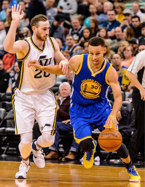 Trent Nelson  |  The Salt Lake Tribune
Golden State Warriors guard Stephen Curry (30) drives with Utah Jazz forward Gordon Hayward (20) defending as the Utah Jazz host the Golden State Warriors in Salt Lake City, Wednesday March 30, 2016.