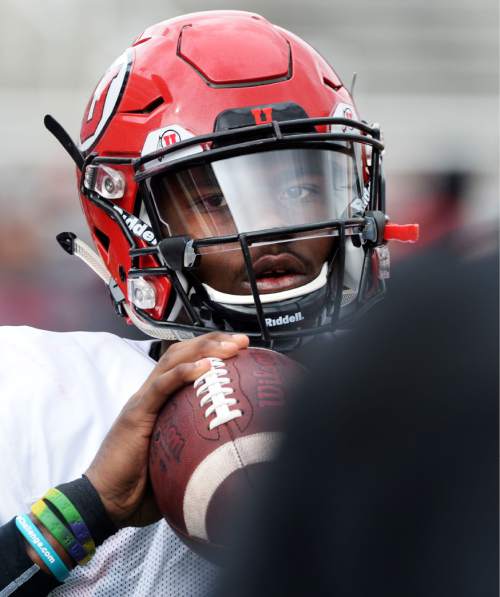 Steve Griffin  |  The Salt Lake Tribune


Utah freshman quarterback Tyler Huntley walks through a play during spring football practice at Rice-Eccles Stadium in Salt Lake City, Tuesday, March 29, 2016. Huntley and Simpkins both attended Hallandale High School in Florida.